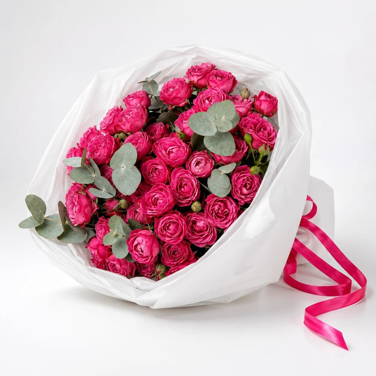 Peony Pink Elegance – 21 Stems featuring fresh pink peony roses wrapped in premium floral paper